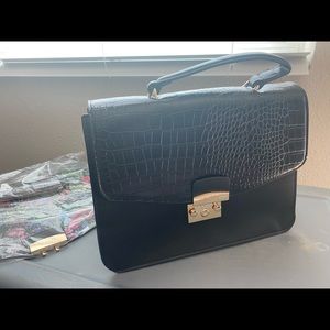 Brand new iman convertible purse